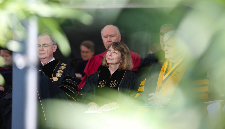 Jill Abramson, former executive editor of The New York Times, listens as she is introduced at the commencement ceremony at Wake Forest University in Winston-Salem,N.C., Monday, May 19, 2014.