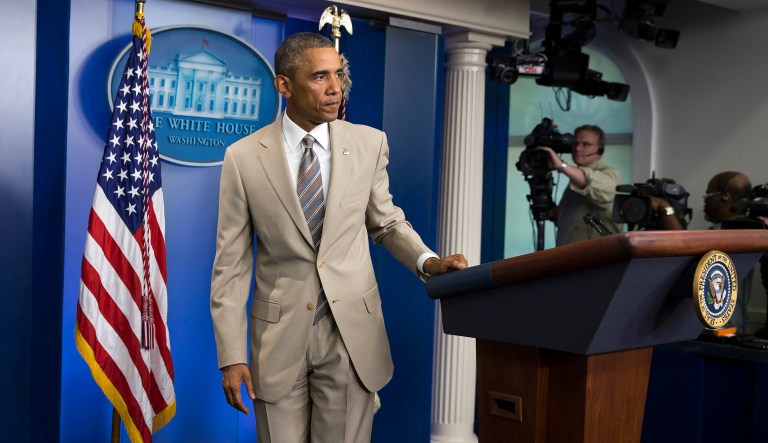 President Barack Obama leaves after speaking about the economy, Iraq, and Ukraine, in the James Brady Press Briefing Room of the White House in Washington, D.C.
