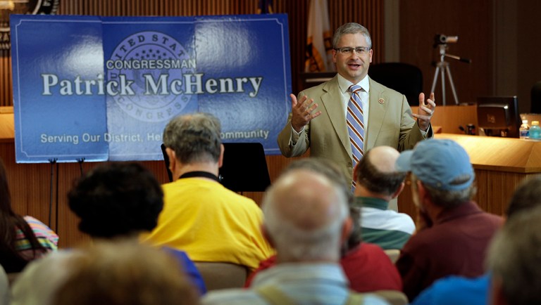 Rep. Patrick McHenry speaks to a full house during a town hall meeting in Lincolnton, N.C.