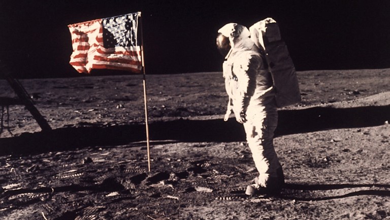 SPACE EXPLORATION, APOLLO 11 MISSION, FIRST  MAN TO LAND ON MOON, WALK ON MOON, AMERICAN ASTRONAUT WITH U.S. FLAG, SPACE SUIT, LUNAR SURFACE, FOOTPRINTS, CENTURY SHOWCASE