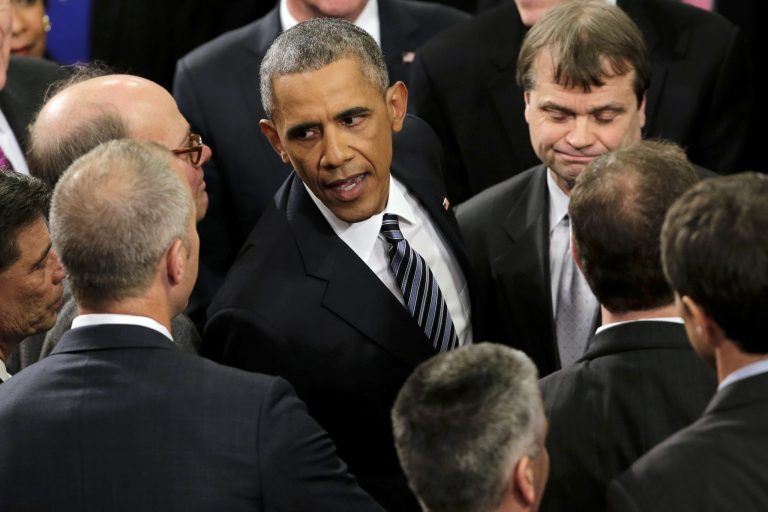 President Barack Obama greets guests after giving his State of the Union address before a joint session of Congress on Capitol Hill in Washington, Tuesday, Jan. 12, 2016.