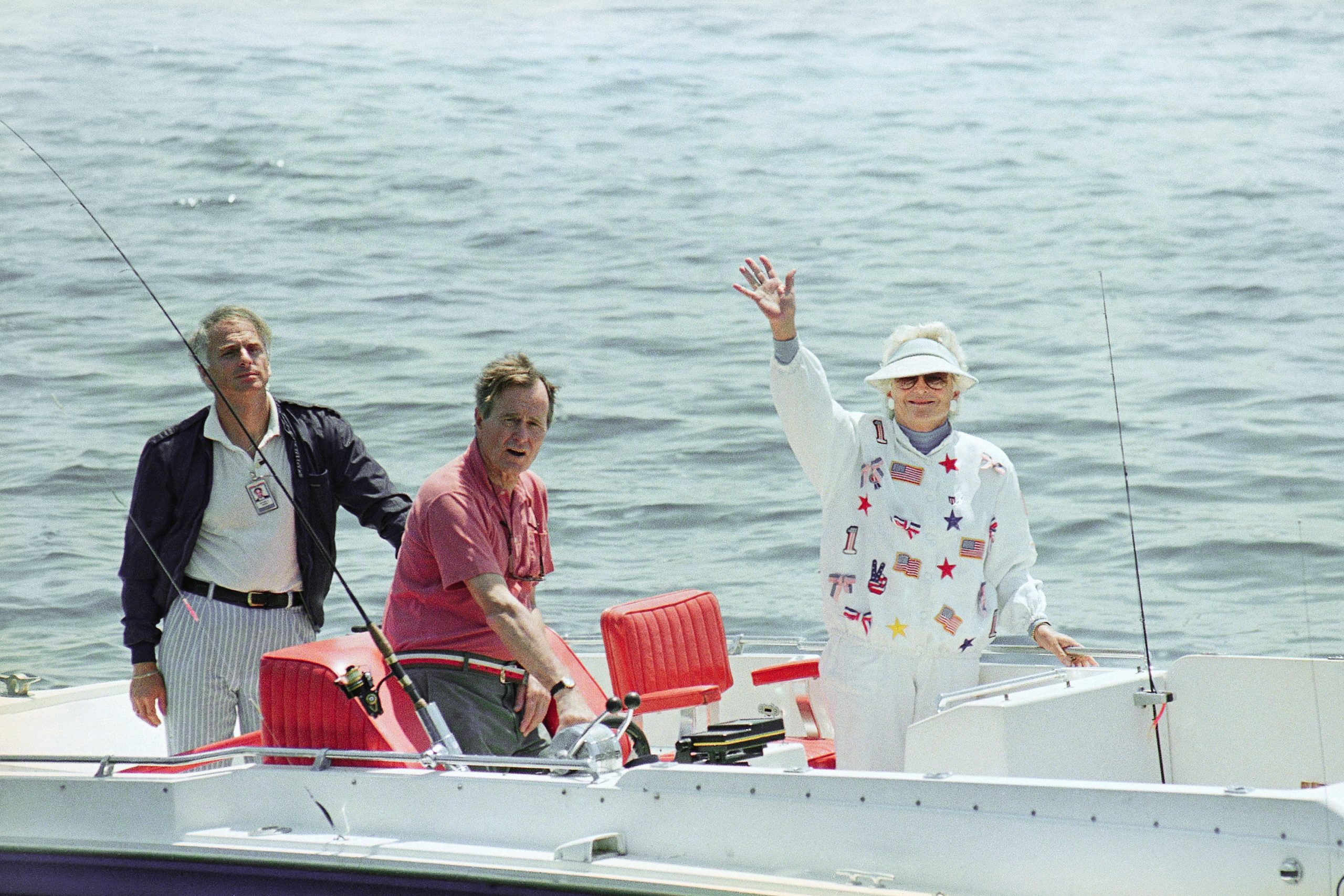 Going strong: George H.W. Bush, 93, back on his boat, ‘besieged by friends’