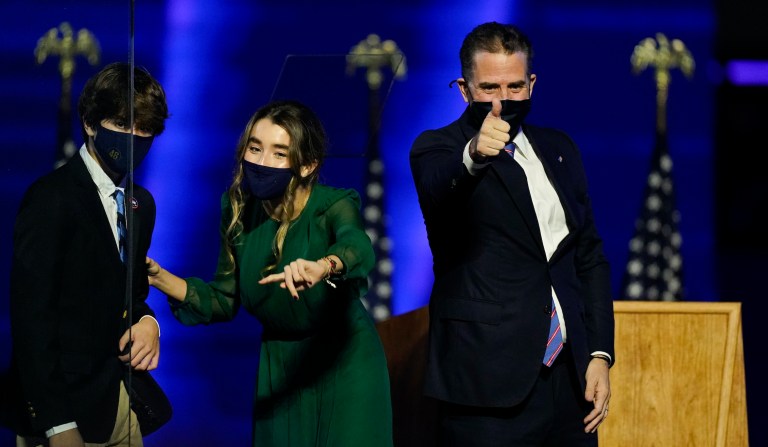Hunter Biden, son of President Joe Biden, gives a thumbs-up as he stands on stage in Wilmington, Delaware.
