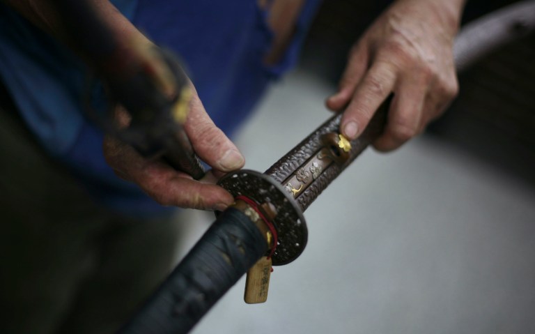 Man allegedly severs woman’s head with sword