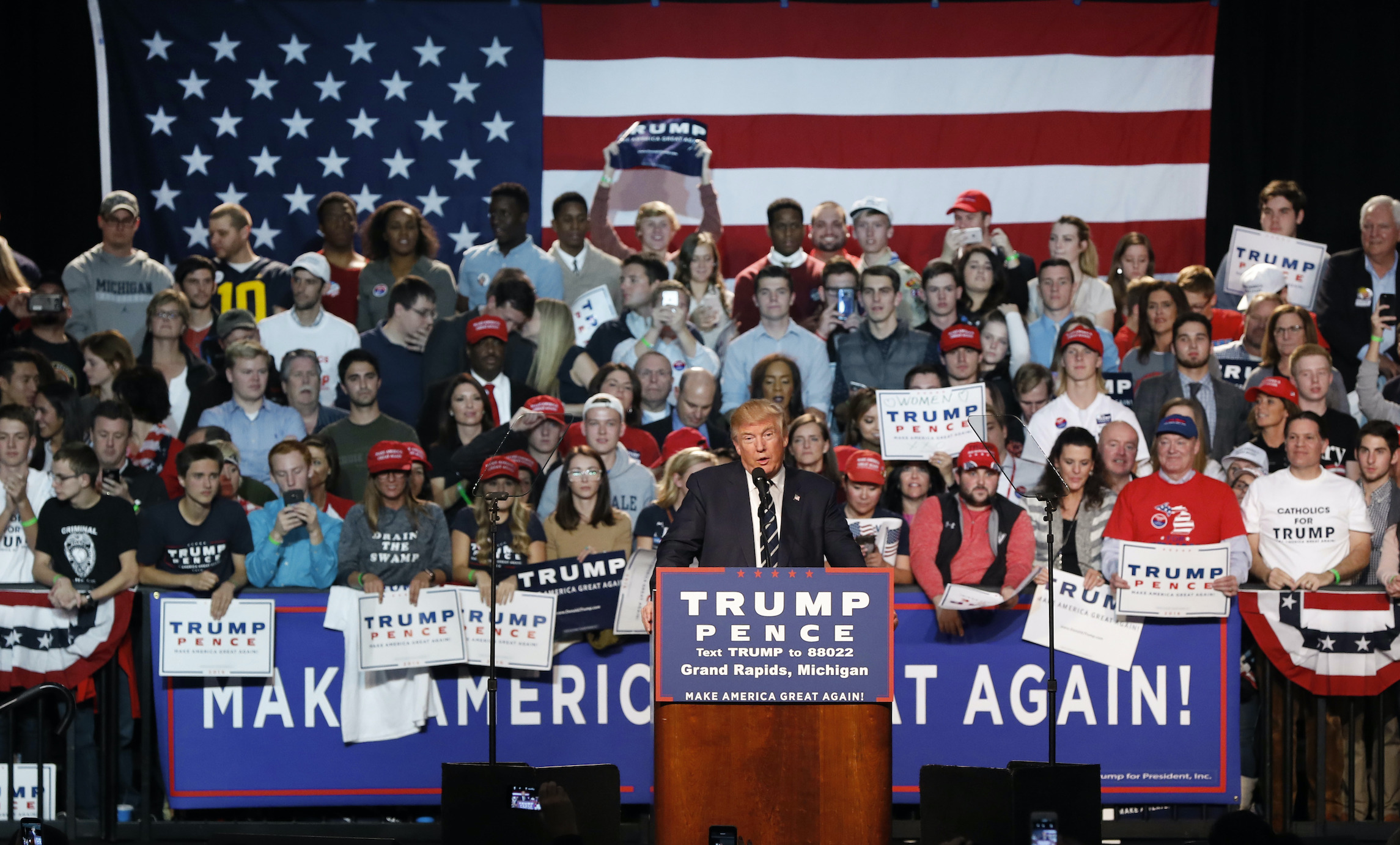 Trump summons ghost of 2016 upset with return to Grand Rapids for final rally