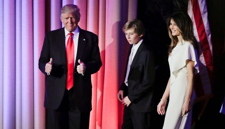Donald Trump celebrates victory on election night 2016 with wife Melania and son Barron.