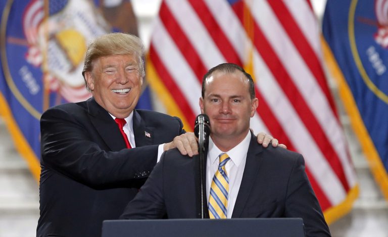 President Donald Trump stand with Sen. Mike Lee, R-Utah, at the Utah State Capitol Monday, Dec. 4, 2017, in Salt Lake City. Trump traveled to Salt Lake City to announce plans to shrink two sprawling national monuments in Utah in a move that will delight the state's GOP politicians and many rural residents who see the lands as prime examples of federal overreach, but will enrage tribes and environmentalist groups who vow to immediately sue to preserve the monuments.