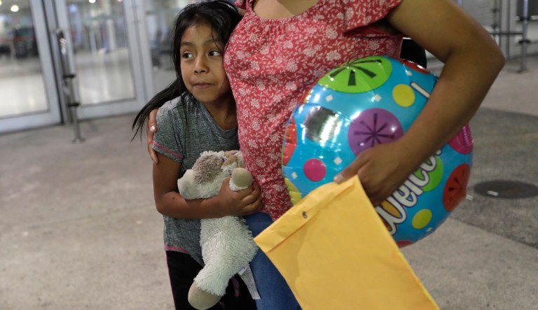 Buena Ventura Martin-Godinez stands with her daughter Janne after being reunited in Miami. Martin crossed the border into the United States from Mexico in May with her son, fleeing violence in Guatemala. Her husband crossed two weeks later with their 7-year-old daughter Janne. All were caught by the Border Patrol, and were separated. Her daughter was released Sunday from a child welfare agency in Michigan. 
