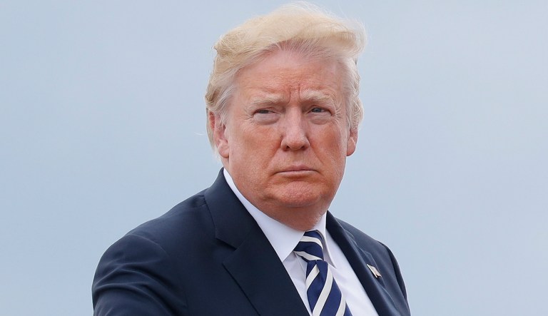 President Trump boards Air Force One as he prepares to travel to Charlotte, N.C.