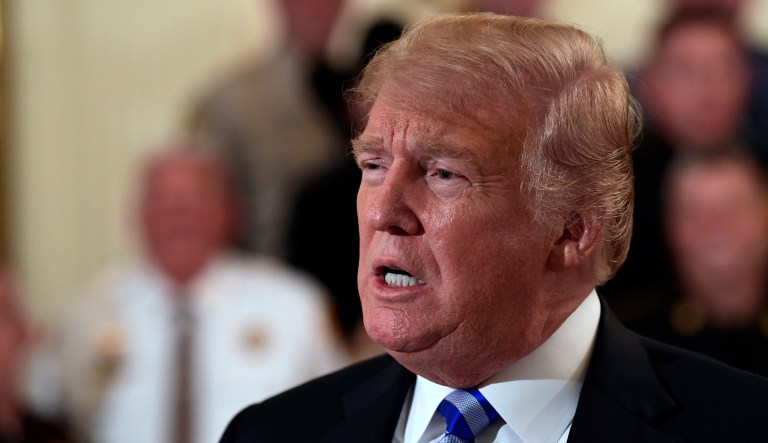 President Trump responds to reporters during an event in the East Room of the White House in Washington, Sept. 5, 2018.