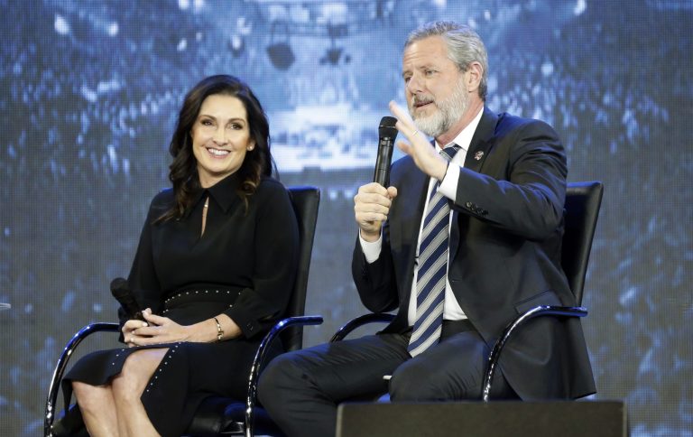 Jerry Falwell Jr., right, gestures as his wife, Becki listens during after a town hall on the opioid crisis at a convocation at Liberty University in Lynchburg, Va., Wednesday, Nov. 28, 2018. In a statement, Falwell has suffered depression.