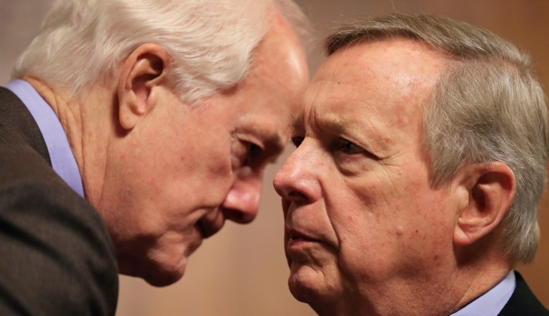 Senate Judiciary Committee members Sen. John Cornyn, R-Texas, left, and Sen. Dick Durbin, D-Ill., confer during a hearing on 'Oversight of U.S. Customs and Border Protection' on Capitol Hill in Washington, Tuesday, Dec. 11, 2018.