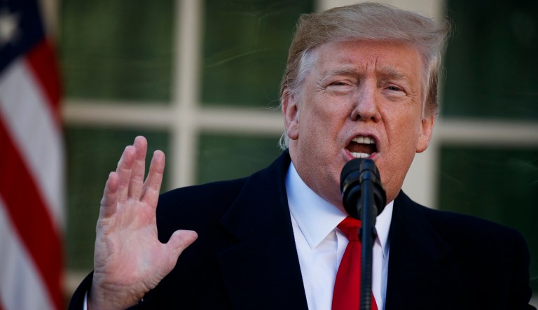 In this Jan. 25, 2019 photo, President Trump speaks in the Rose Garden of the White House in Washington. 