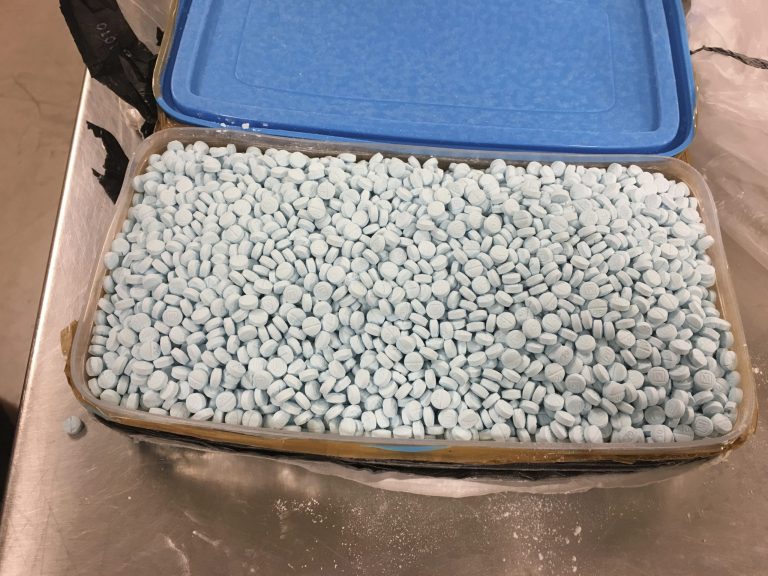 This photo provided by the U.S. Drug Enforcement Administration's Phoenix Division shows some of the 30,000 fentanyl pills the agency seized in one of its bigger busts in Tempe, Arizona, in 2017.
