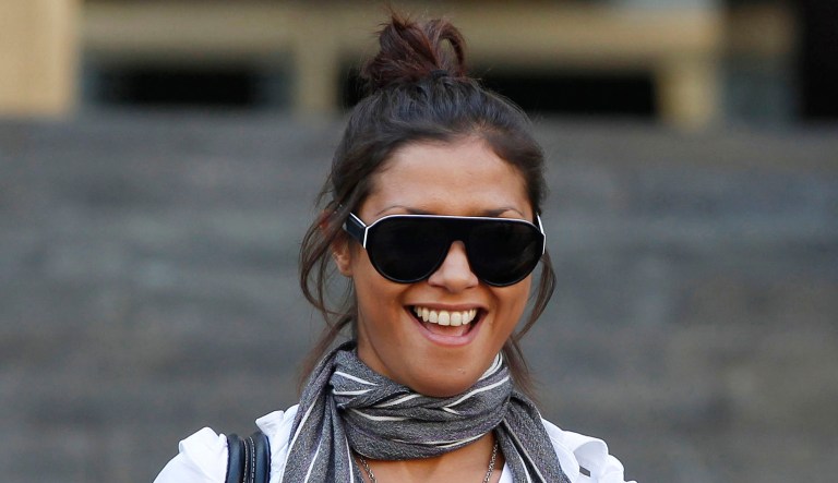 Imane Fadil smiles as she leaves the court in Milan, Italy.
