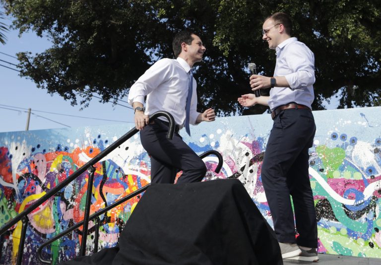 Democratic presidential candidate Pete Buttigieg, left, is introduced by his husband Chasten Buttigieg, right, during a fundraiser at the Wynwood Walls, in Miami. Pollster John Zogby said the relationship could cause the candidate problems in a close election.