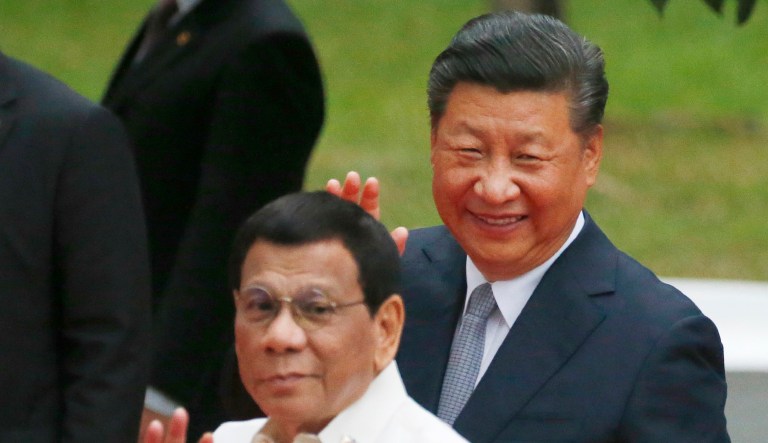 As Marcos stands up for the Philippines, Rodrigo Duterte performs for Xi in Beijing