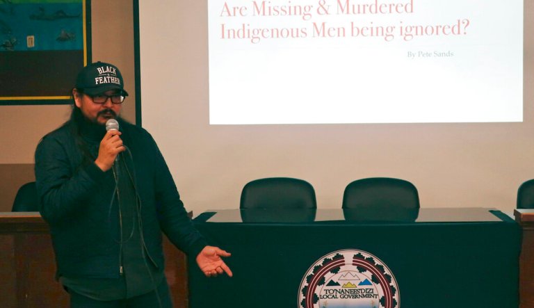 In this Jan. 14, 2020, photo, Navajo musician and filmmaker Pete Sands talks about missing indigenous men at a forum in Tuba City, Ariz. People were gathered to talk not about women and girls who have disappeared or been killed, but men. It's a shift from a larger movement focused on Native American women, who face some of the nation's highest homicide, sexual violence, and domestic abuse rates.