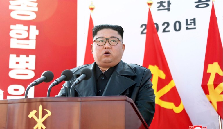 In this Tuesday, March 17, 2020, photo provided on Wednesday, March 18, 2020, by the North Korean government, North Korean leader Kim Jong Un delivers a speech during the ground-breaking ceremony of a general hospital in Pyongyang, North Korea.