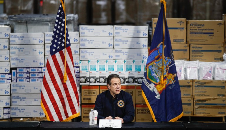 New York Gov. Andrew Cuomo speaks during a news conference against a backdrop of medical supplies at the Jacob Javits Center that will house a temporary hospital in response to the COVID-19 outbreak in New York. 