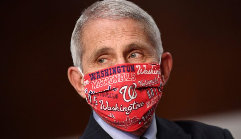 Dr. Anthony Fauci, director of the National Institute for Allergy and Infectious Diseases, prepares to testify before a Senate Health, Education, Labor and Pensions Committee hearing on Capitol Hill in Washington, Tuesday, June 30, 2020.