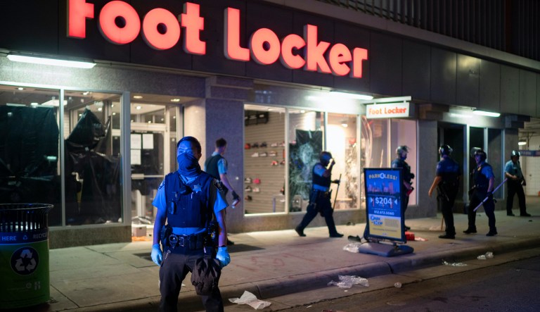 Dozens arrested during night of looting in Minneapolis after homicide suspect's suicide