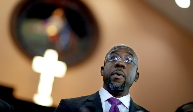FILE -  In this Jan. 12, 2018 file photo Rev. Raphael Warnock speaks at Ebenezer Baptist Church in Atlanta. 