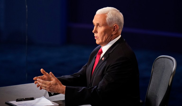 Vice President Mike Pence responds during the vice presidential debate with Democratic vice presidential candidate Sen. Kamala Harris, D-Calif., Wednesday, Oct. 7, 2020, at Kingsbury Hall on the campus of the University of Utah in Salt Lake City. (AP Photo/Julio Cortez) 