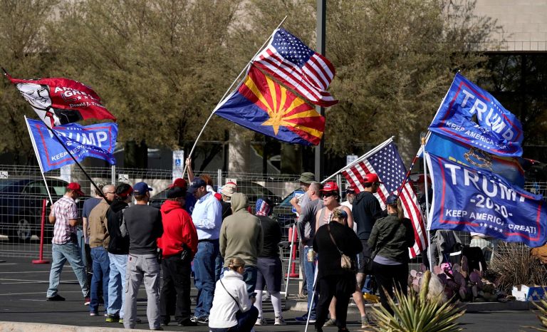 Supporters of President Donald Trump rally in front of the Maricopa County Recorder's Office as the votes continue to be counted, Monday, Nov. 9, 2020, in Phoenix. 