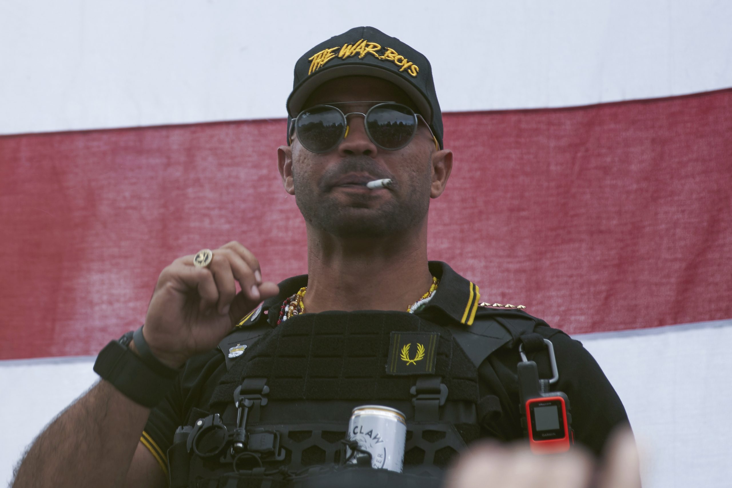 Proud Boys leader pleads guilty to burning Black Lives Matter banner and weapons charge