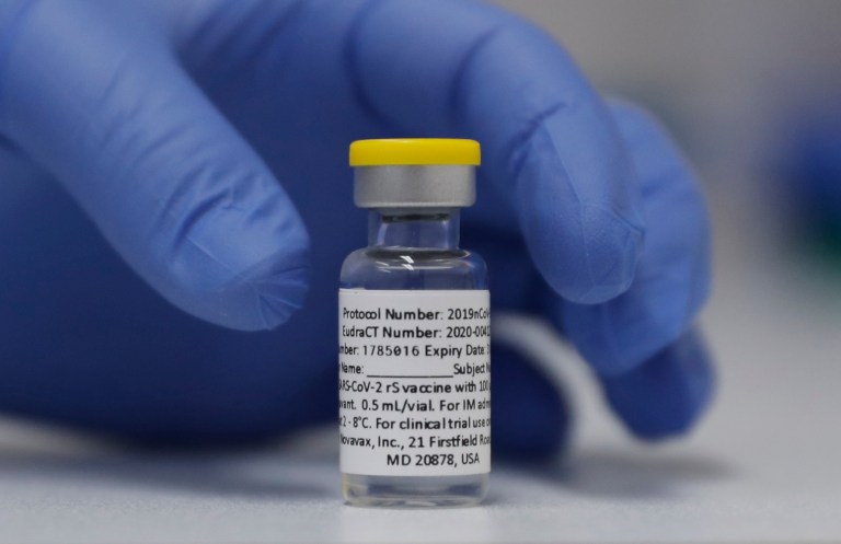 A vial of the Phase 3 Novavax coronavirus vaccine is seen ready for use in the trial at St. George's University hospital in London Wednesday, Oct. 7, 2020.