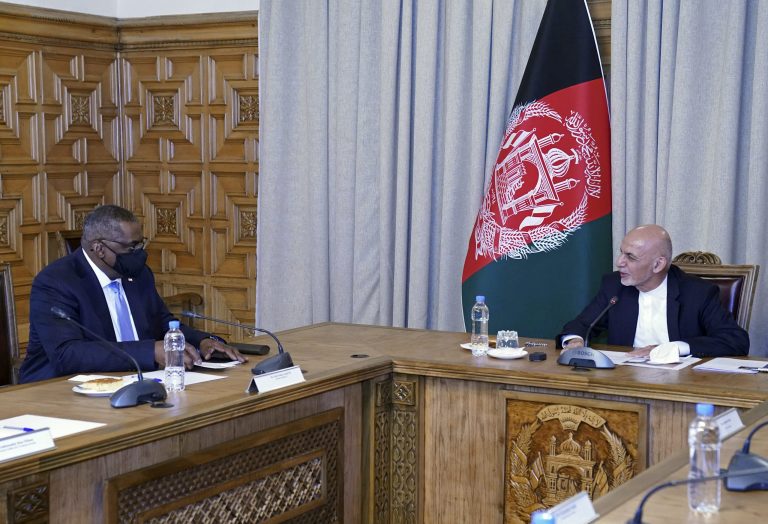 U.S. Defense Secretary Lloyd Austin, left, meets Afgan President Ashraf Ghani at the presidential palace in Kabul, Afghanistan, Sunday, March 21, 2021. Austin arrived in Kabul on his first trip to Afghanistan as Pentagon chief, amid swirling questions about how long American troops will remain in the country. 