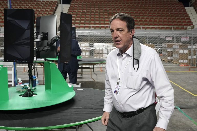 FILE - In this Thursday, April 22, 2021, file photo, former Arizona Secretary of State Ken Bennett arrives at a news conference to talk about overseeing a 2020 election ballot audit. (AP Photo/Ross D. Franklin, File)