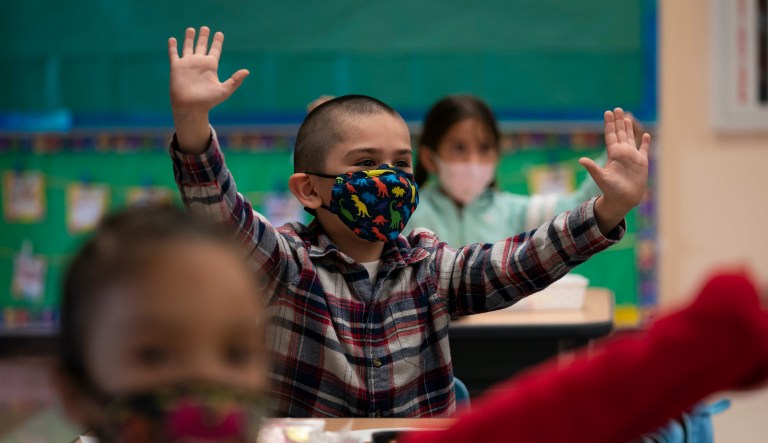 In this April 13, 2021, file photo, kindergarten students participate in a classroom activity on the first day of in-person learning at Maurice Sendak Elementary School in Los Angeles.