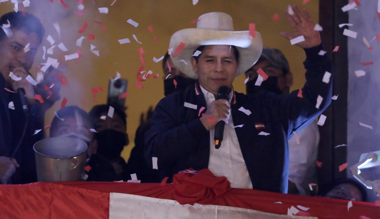 Pedro Castillo celebrates after being declared president-elect of Peru by election authorities, at his partyÂ´'s campaign headquarters in Lima Peru, Monday, July 19, 2021. 