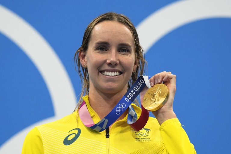Emma Mckeon, of Australia, poses after winning the gold medal in the women's 50-meter freestyle final at the 2020 Summer Olympics, Sunday, Aug. 1, 2021, in Tokyo, Japan.