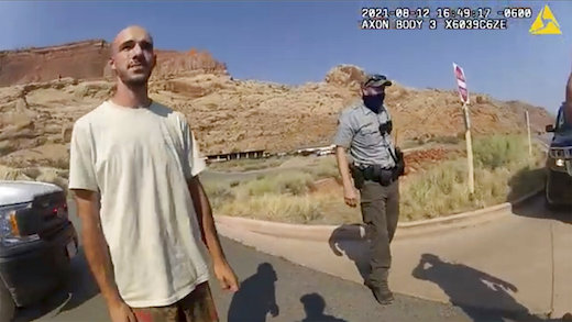 This police camera video provided by The Moab Police Department shows Brian Laundrie  talking to a police officer after police pulled over the van he was traveling in with his girlfriend, Gabrielle âGabbyâ Petito, near the entrance to Arches National Park on Aug. 12, 2021. The couple was pulled over while they were having an emotional fight. Petito was reported missing by her family a month later. (The Moab Police Department via AP)