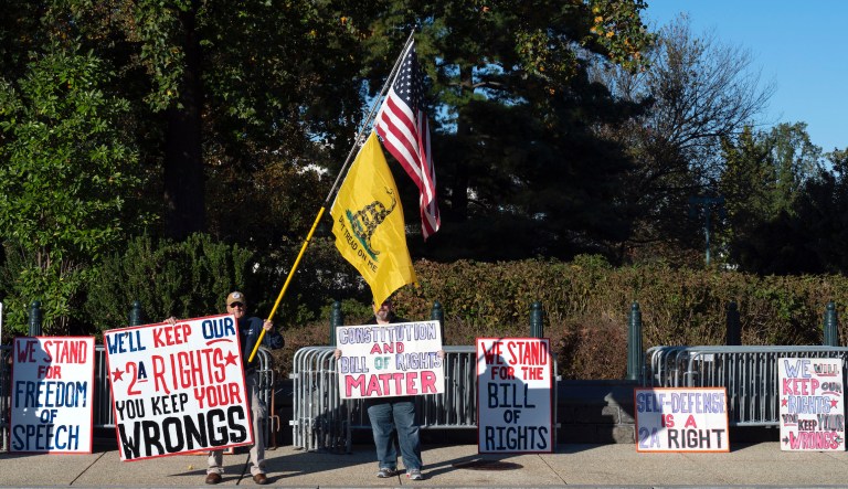 Demonstrators rally outside the U.S. Supreme Court in Washington, Wednesday, Nov. 3, 2021.