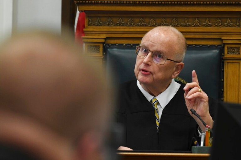 Assistant District Attorney Thomas Binger is admonished by Circuit Court Judge Bruce Schroeder during Kyle Rittenhouse's trial at the Kenosha County Courthouse in Kenosha, Wisconsin, on Wednesday.