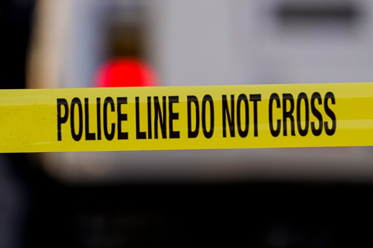 Police tape surrounds the scene of a shooting. (AP Photo/Matt Rourke)