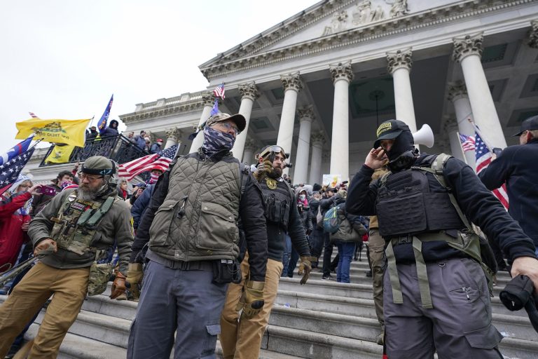 Members of the Oath Keepers on the East Front of the U.S. Capitol on Jan. 6, 2021, in Washington. 