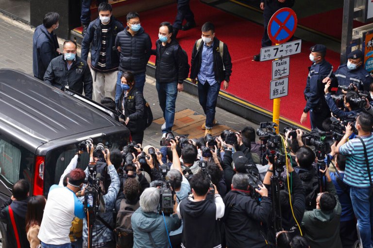 Hong Kong police arrest six after raiding pro-democracy news outlet