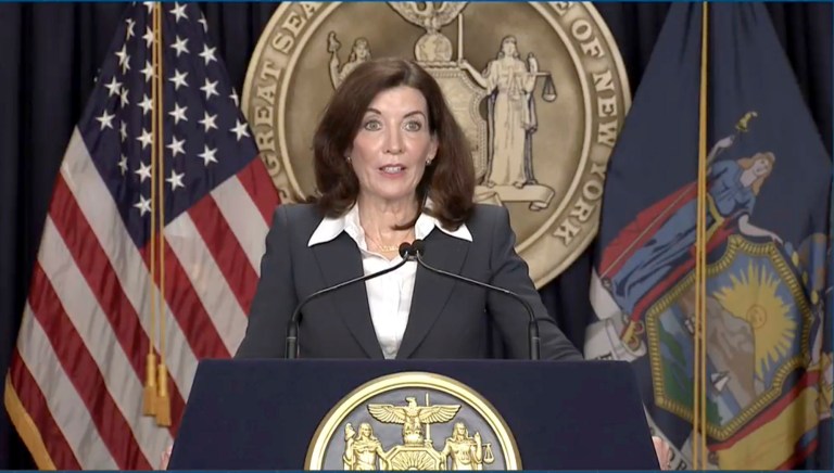 This image taken from a video provided by the Office of the Governor of New York shows New York Gov. Kathy Hochul as she makes an announcement, in New York, Wednesday, Feb. 9, 2022. Hochul announced Wednesday that the state will end a COVID-19 mandate requiring face coverings in most indoor public settings but will keep masking rules in place in schools for now. 
