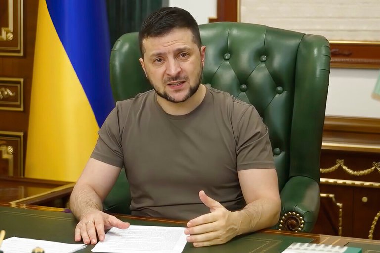 In this image from a video provided by the Ukrainian Presidential Press Office, Ukrainian President Volodymyr Zelensky speaks from Kyiv, Ukraine, early Monday.