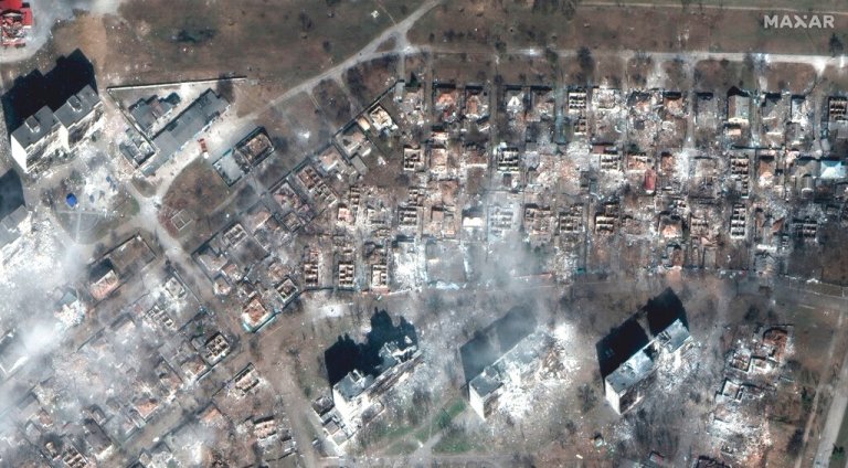 Damaged apartment buildings and homes in Mariupol, Ukraine, Tuesday, March 29, 2022.