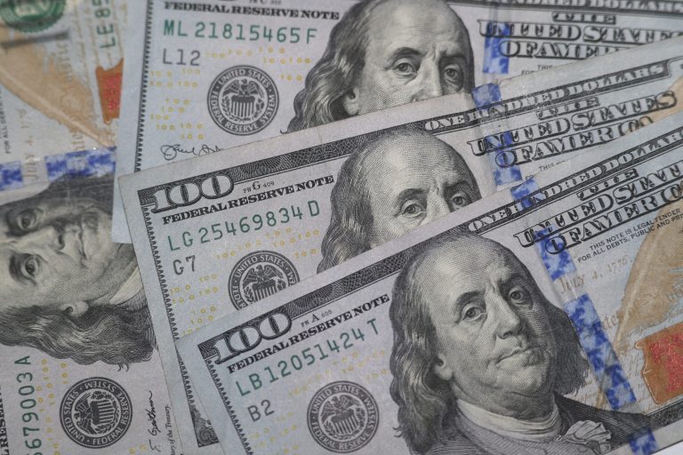 FILE - This Jan. 22, 2020, file photo shows the likeness of Benjamin Franklin on $100 bills in Dallas. (AP Photo/LM Otero, File)