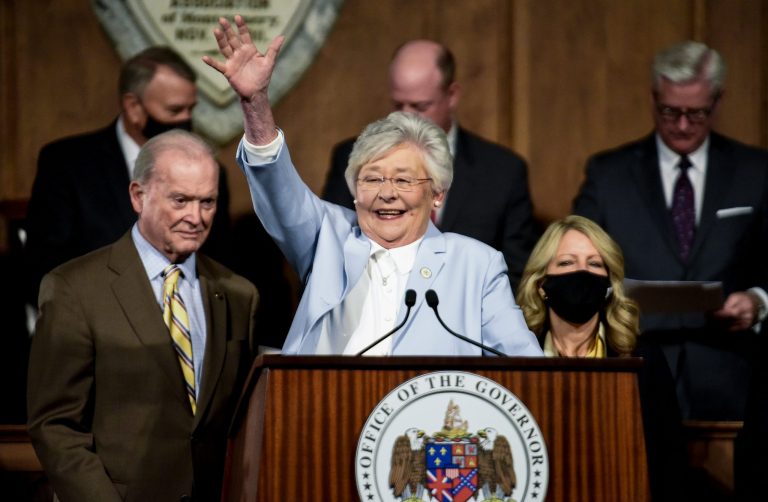 FILE - Alabama Gov. Kay Ivey waves as she arrives to deliver her State of the State address at the State Capitol Building in Montgomery, Ala., Jan. 11, 2022.