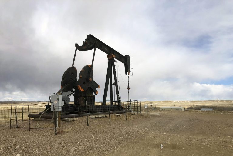 An oil well near Casper, Wyoming. The Biden administration is auctioning off roughly 35,000 acres of land in Wyoming Tuesday, the first in a spate of new oil and gas auctions slated to take place in the shadow of the COP28 summit in Dubai.