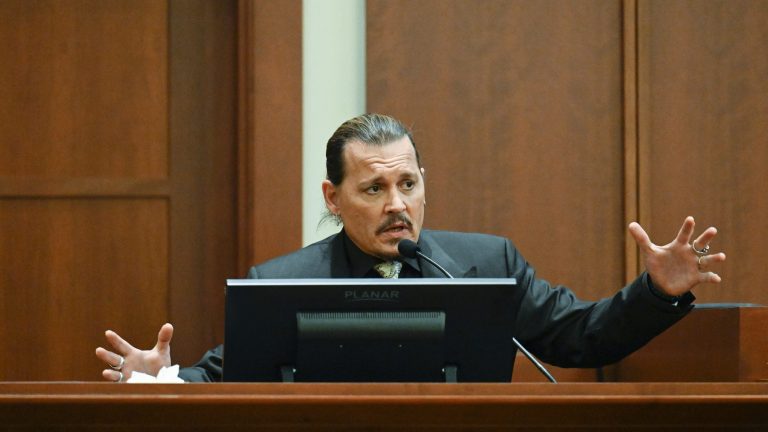 Actor Johnny Depp testifies during a hearing at the Fairfax County Circuit Court in Fairfax, Virginia.