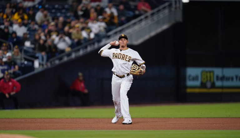 San Diego Padres third baseman Manny Machado throws to first of a baseball game against the Cincinnati Reds Tuesday, April 19, 2022, in San Diego.